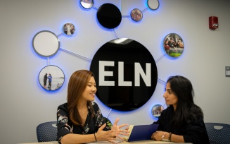 Pemba Sherpa (left) and Hemanta Adhikari, undergrad students, have created “Scholars of Tomorrow.” Through their program, they will deliver jackets and school supplies, paid for through a GoFundMe campaign, to Shree Janasewa Basic Secondary School in remote Nepal in December 2019. The pair are photographed in the Experiential Learning Netowrk office in Capen Hall in November 2019. Photographer: Meredith Forrest Kulwicki.