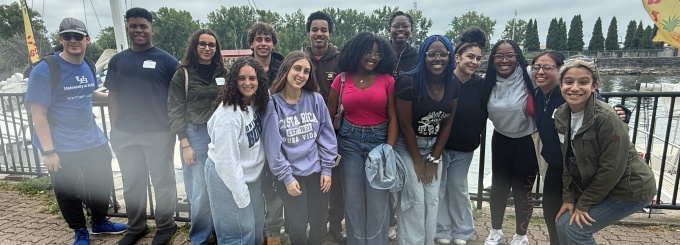 Group of 14 Generation Honors Scholars posing along the Buffalo waterfront.