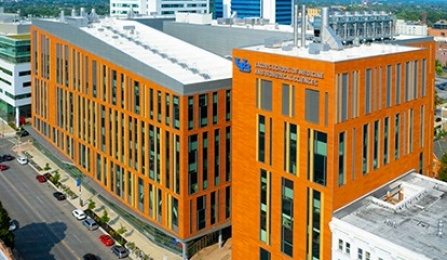 Aerial image of the exterior of the Medical School Building, home of the Jacobs School of Medicine and Biomedical Sciences, in downtown Buffalo, NY photographed in August 2021. Photographer: Douglas Levere. 