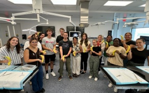 Group photo of 2024 CLIMB UP Scholars in suturing skills course. 