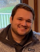 headshot of Justin Downey.