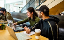 Students studying in One World Cafe. 