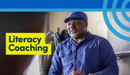 Person with a hat and glasses talking.