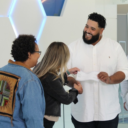 Arbol receives $100,000 check from Cultivator.