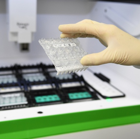 A lab run by SUNY Upstate Medical University and Syracuse-based Quadrant Biosciences, and operating in Farber Hall opened in April 2021. The lab greatly increases SUNY’s COVID-19 surveillance testing capacity and can process up to 150,000 saliva tests per week. Photographer: Douglas Levere.