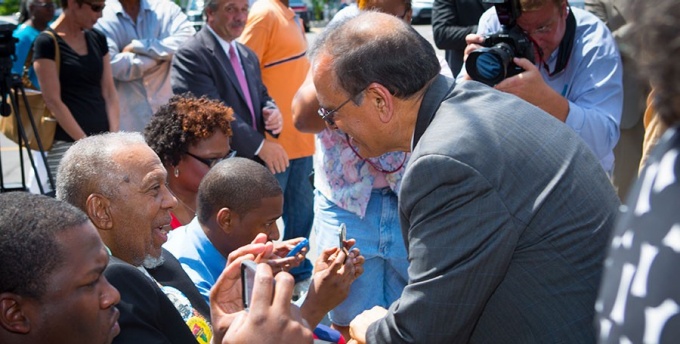 President Tripathi congratulates Arthur O. Eve.