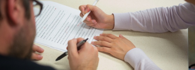Students being tutored in the Center for Excellence in Writing in Baldy Hall Photographer: Douglas Levere.