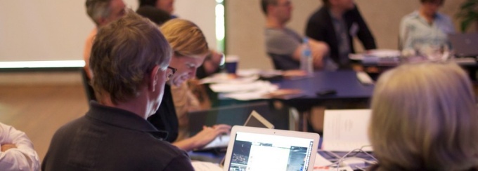 silhouettes of people talking.