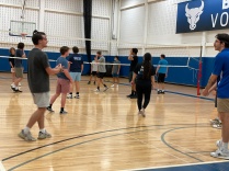 students playing volleyball.
