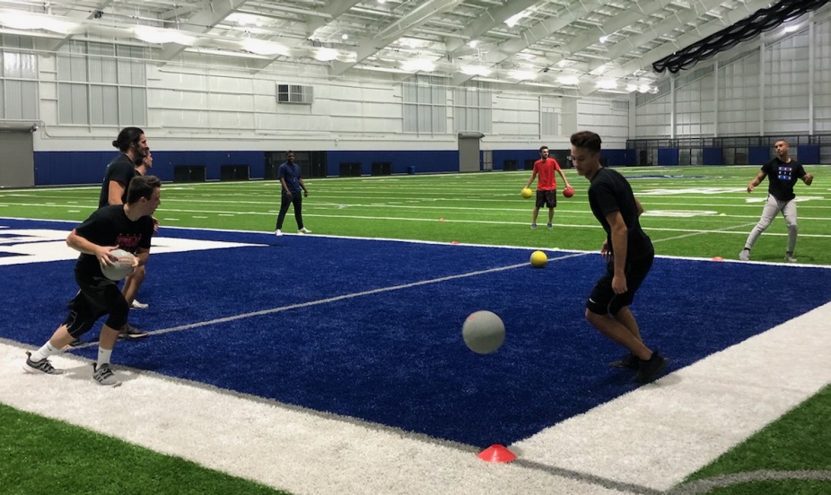 students playing dodgeball in the Fieldhouse.