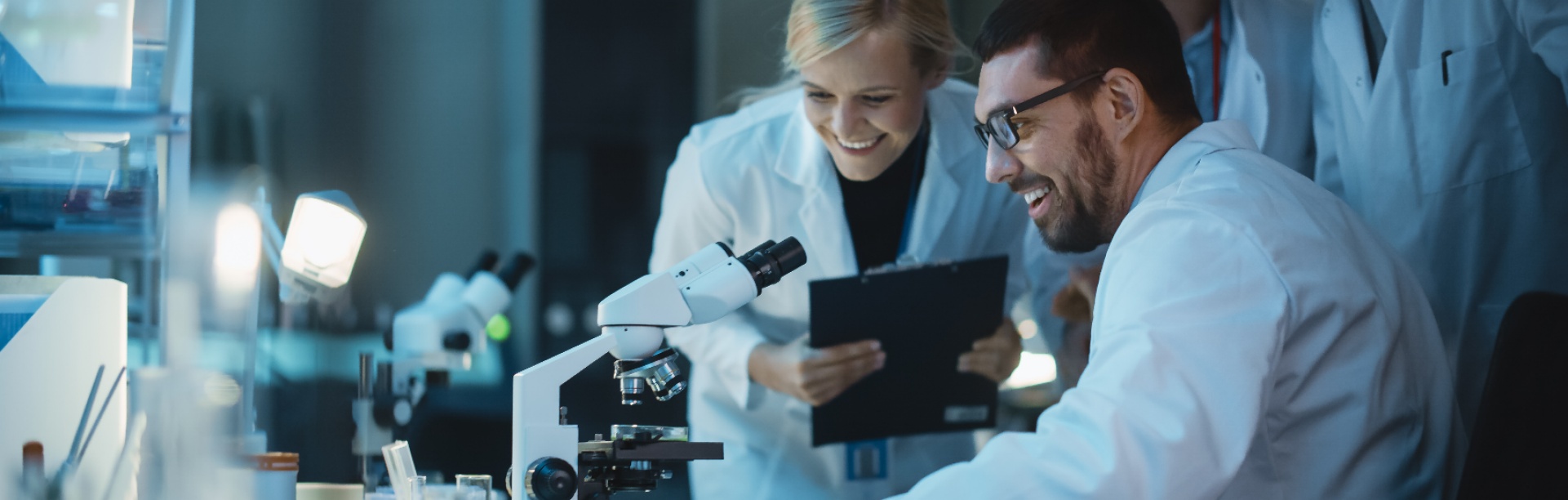 scientific team making discovery in a lab. 