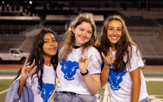 Students gather for the New Student Welcome event at the UB Stadium in August 2022. They walked on the field to form the interlocking UB. Photographer: Meredith Forrest Kulwicki.