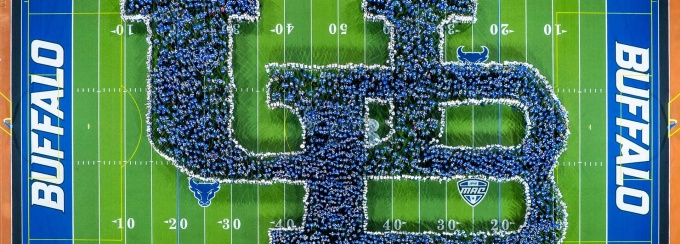UB's Class of 2026 forms a human interlocking UB symbol.