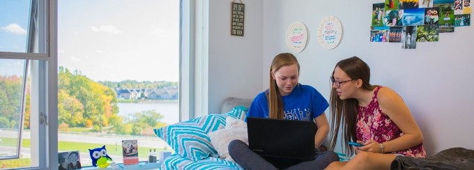Students talking in their room.