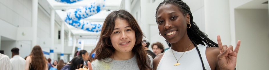 Students celebrating commencement in the CFA.