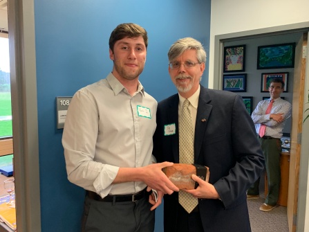 Jim Jensen accepts 2019 SLICE award.