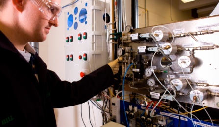 Student researching in lab.