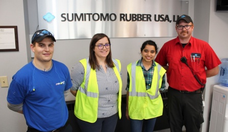 Student Black Belt candidates Fanni Kozma and Manimanjari "Manjari" Vemula, at center, pose with their supervisors at Sumitomo Rubber USA. At far left is Anthony Lauria and at far right is Chris Holzmann.
