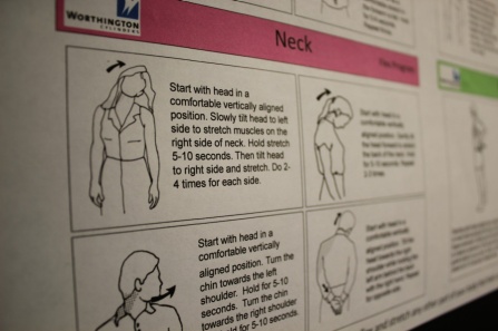 Worker safety poster hanging at Worthington Cylinders facility.