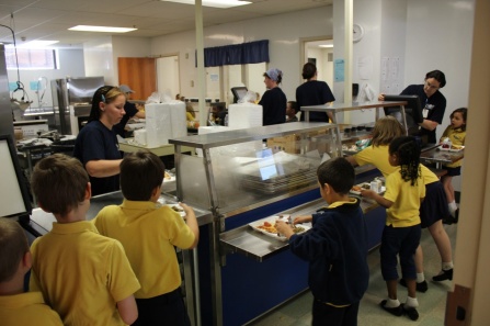 Students lined up for lunch at Charter School for Applied Technologies.
