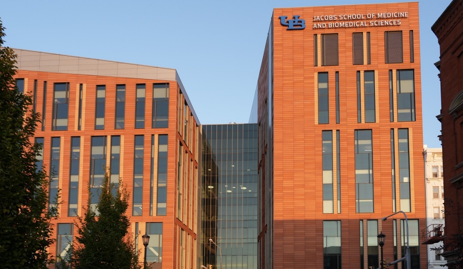 Exterior photo of the Jacobs School of Medicine and Biomedical Sciences. 