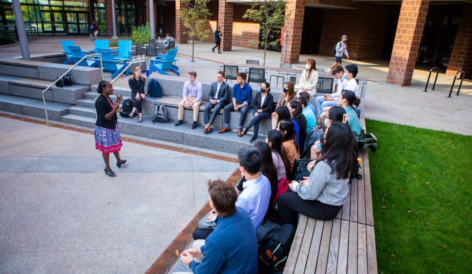 Professor Siaw-Asamoah teaches a class outside in Paula T. Agrusa Plaza. 