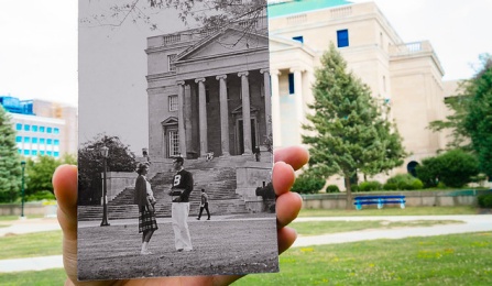 Health Science Library, hand holding older photo of the same location.