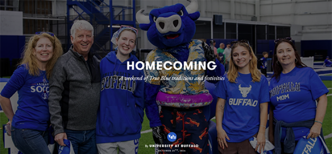 UB alumni, parents and students enjoying Homecoming in the Murchie Family Fieldhouse next to Victor E. Bull. 