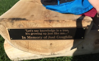 Plaque and quote on Joel's bench.