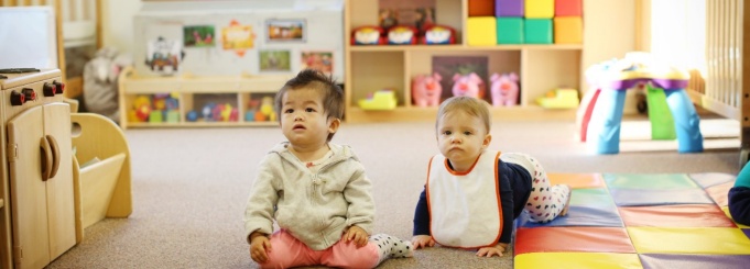 Picture of infants on the mat.