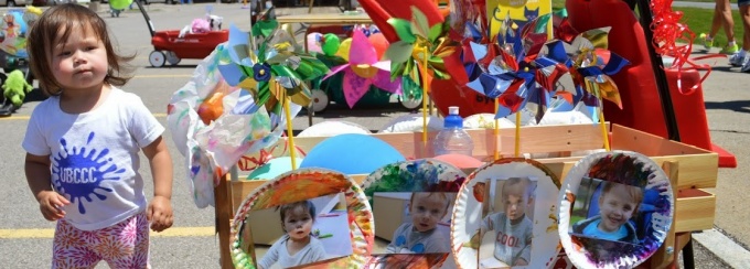 toddler child with wagon display.