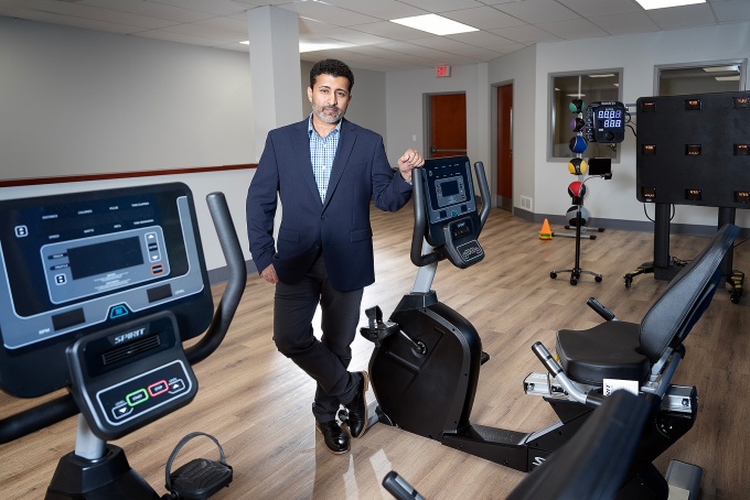 Nikhil Satchidanand in an exercise room. 