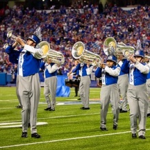 The UB Marching Band during a mid-field performance. 