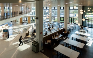 Zoom image: Students enjoy the newly renovated Student Union lobby area on the first day of classes for the fall semester in August 2024. Photographer: Douglas Levere