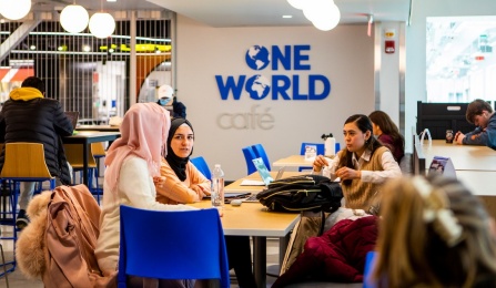 Students and others meet, study, and socialize in the spaces of One World Café in March 2022. Photographer: Douglas Levere.