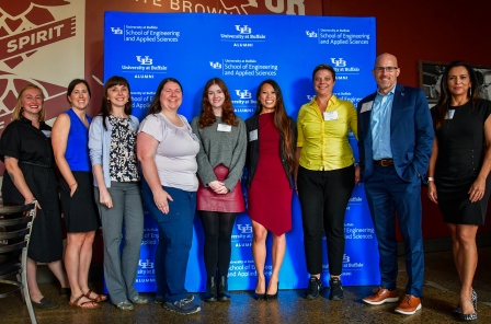 Group of faculty and staff at anniversary celebration.